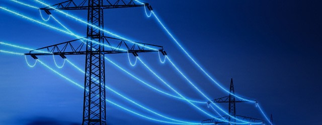 Illuminated power lines --- Image by © Matthias Kulka/Corbis