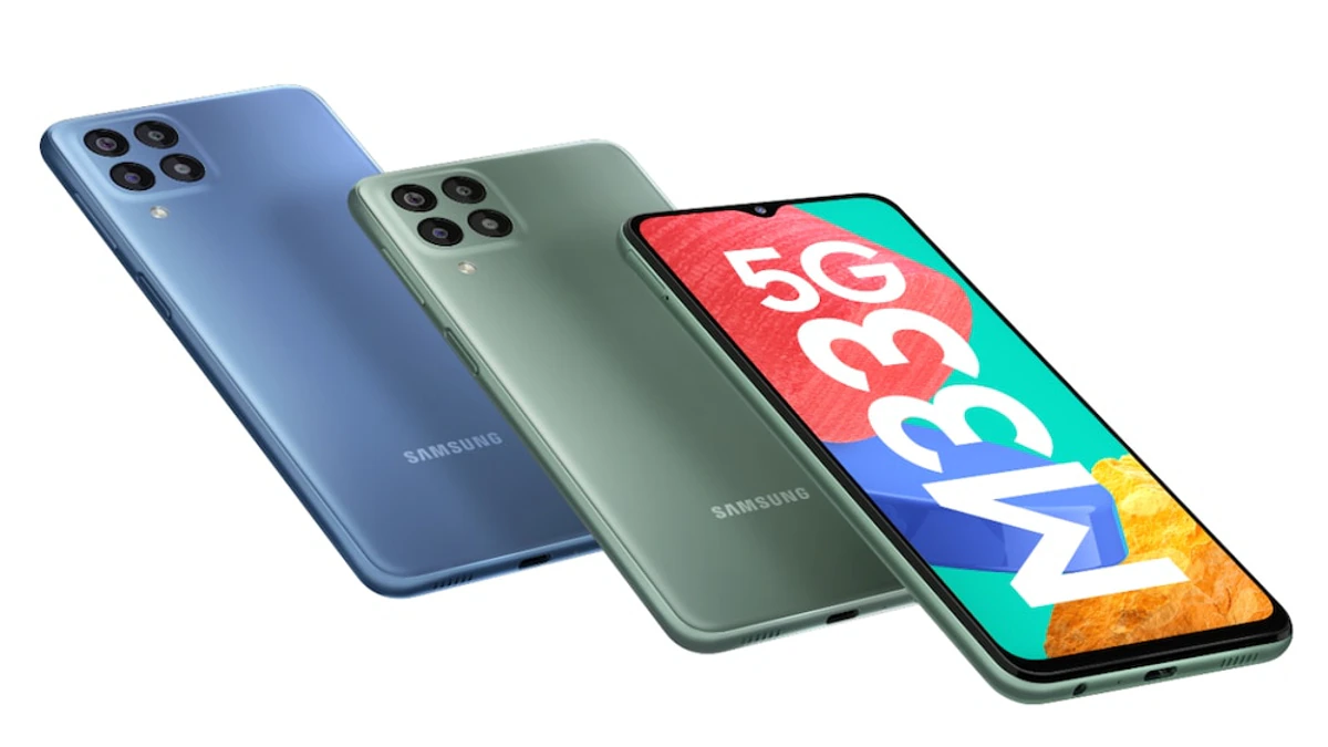 Fundo branco destacando 3 celulares Samsung M34 nas cores azul, verde e preto