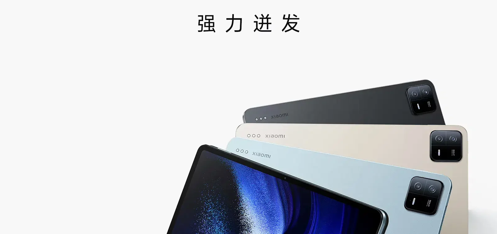 Modelos do tablet Xiaomi X Pad Pro Max nas cores preta, branca e verde, com destaque para câmera traseira